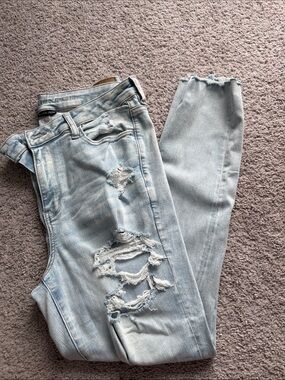 American Eagle Outfitters High Waisted Light Blue Distressed Jeggings